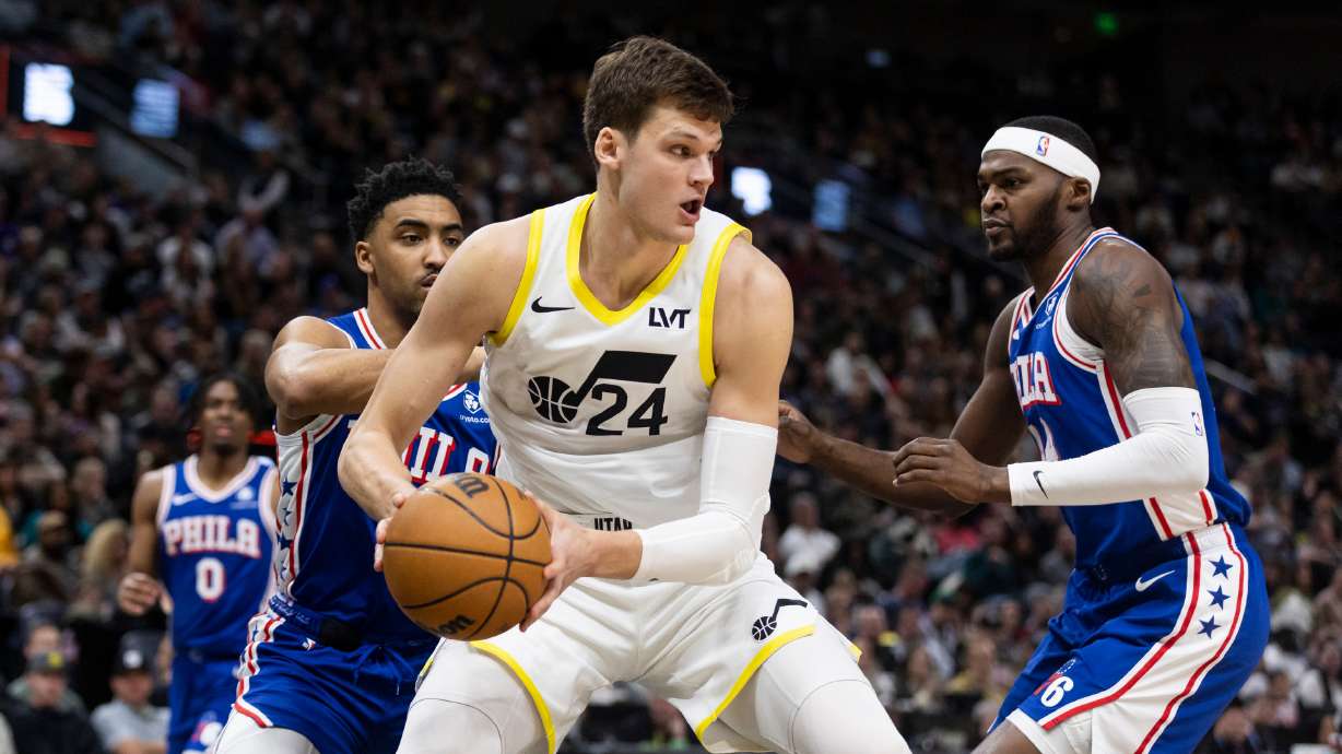 Utah Jazz center Walker Kessler (24) handles the ball during an NBA game at the Delta Center in Salt Lake City on Thursday, Feb. 1, 2024. Philadelphia won 127-124.