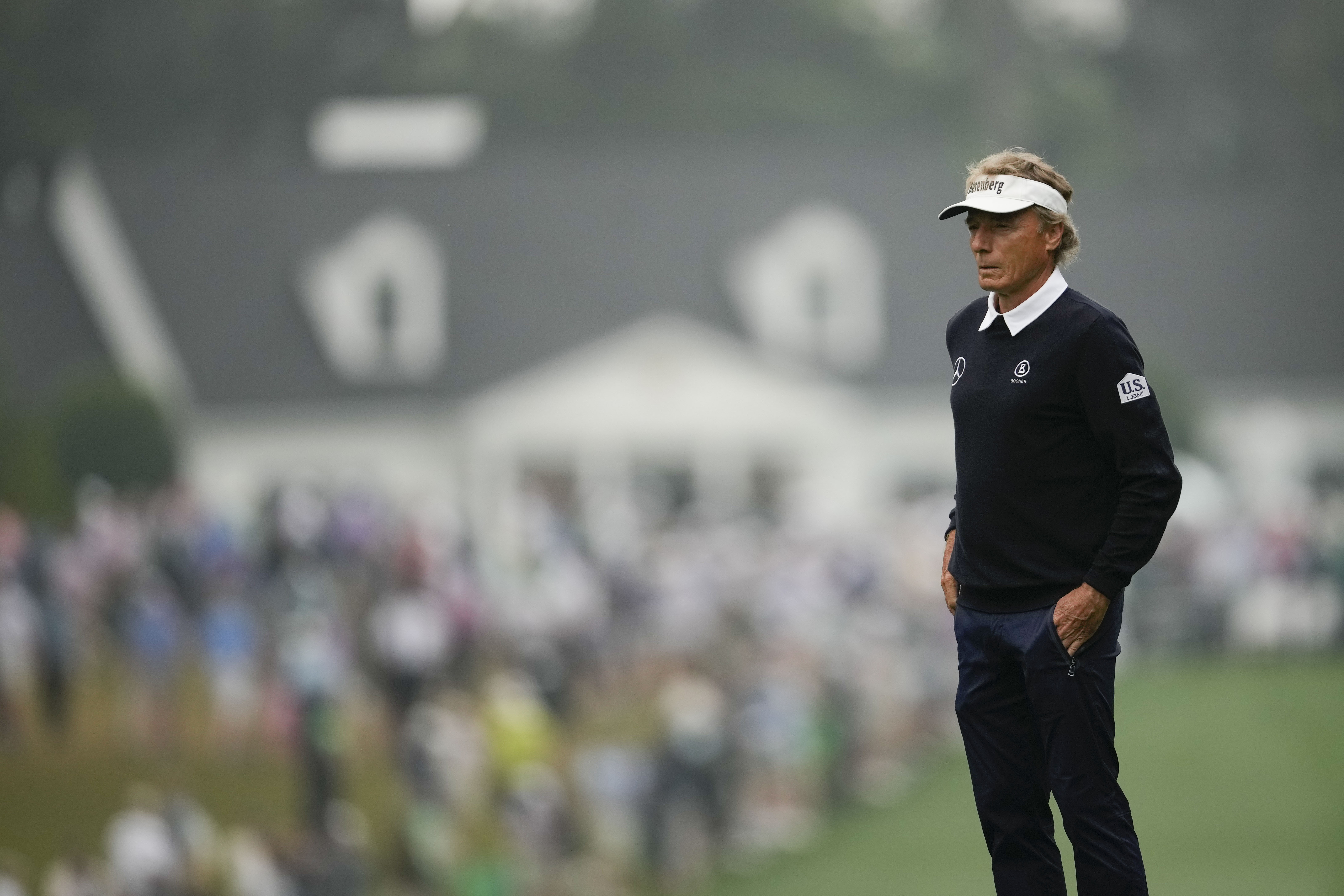 FILE - Bernhard Langer, of Germany, waits to hit on the first hole during the second round of the Masters golf tournament at Augusta National Golf Club on Friday, April 7, 2023, in Augusta, Ga. Langer had surgery for an Achilles' tendon tear on Friday, Feb. 2, 2024. He had said this year would be his last time playing the Masters. 