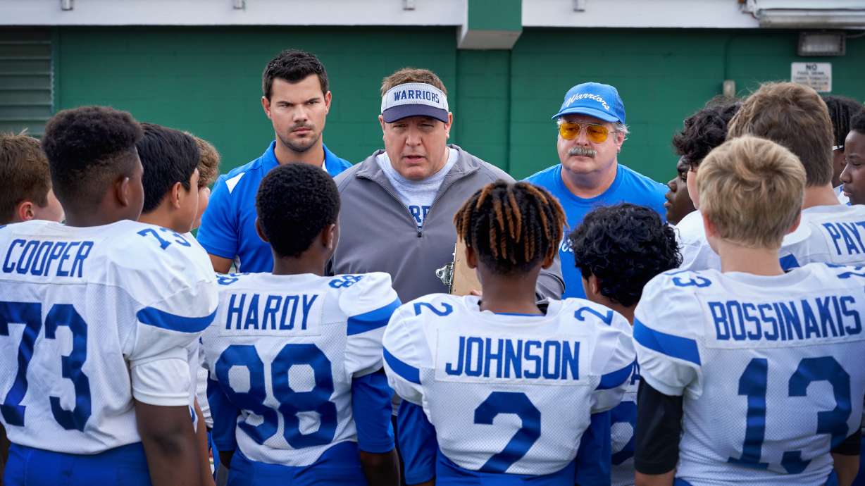Home Team (L-R) Jacob Perez as Marcos, Taylor Lautner as Troy Lambert, Christopher Farrar as Jason, Kevin James as Sean Payton, Gary Valentine as Mitch Bizone, Manny Magnus as Harlan, Tait Blum as Connor.