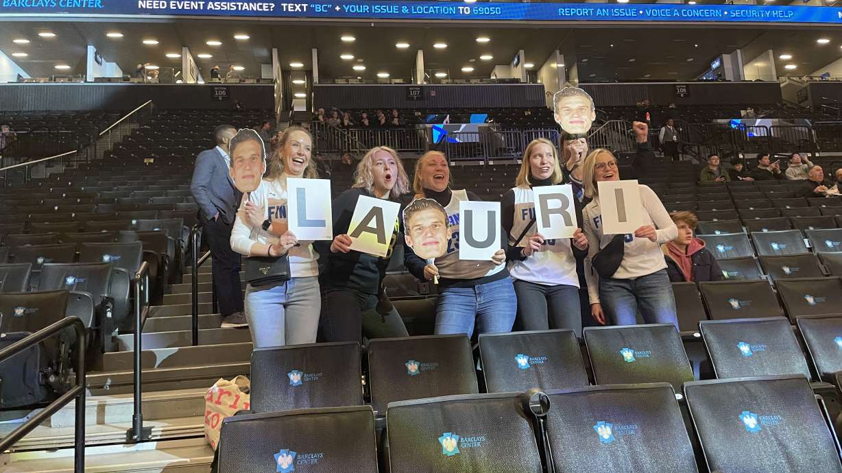 Fans of Lauri Markkanen cheer before the Jazz game in Brooklyn.