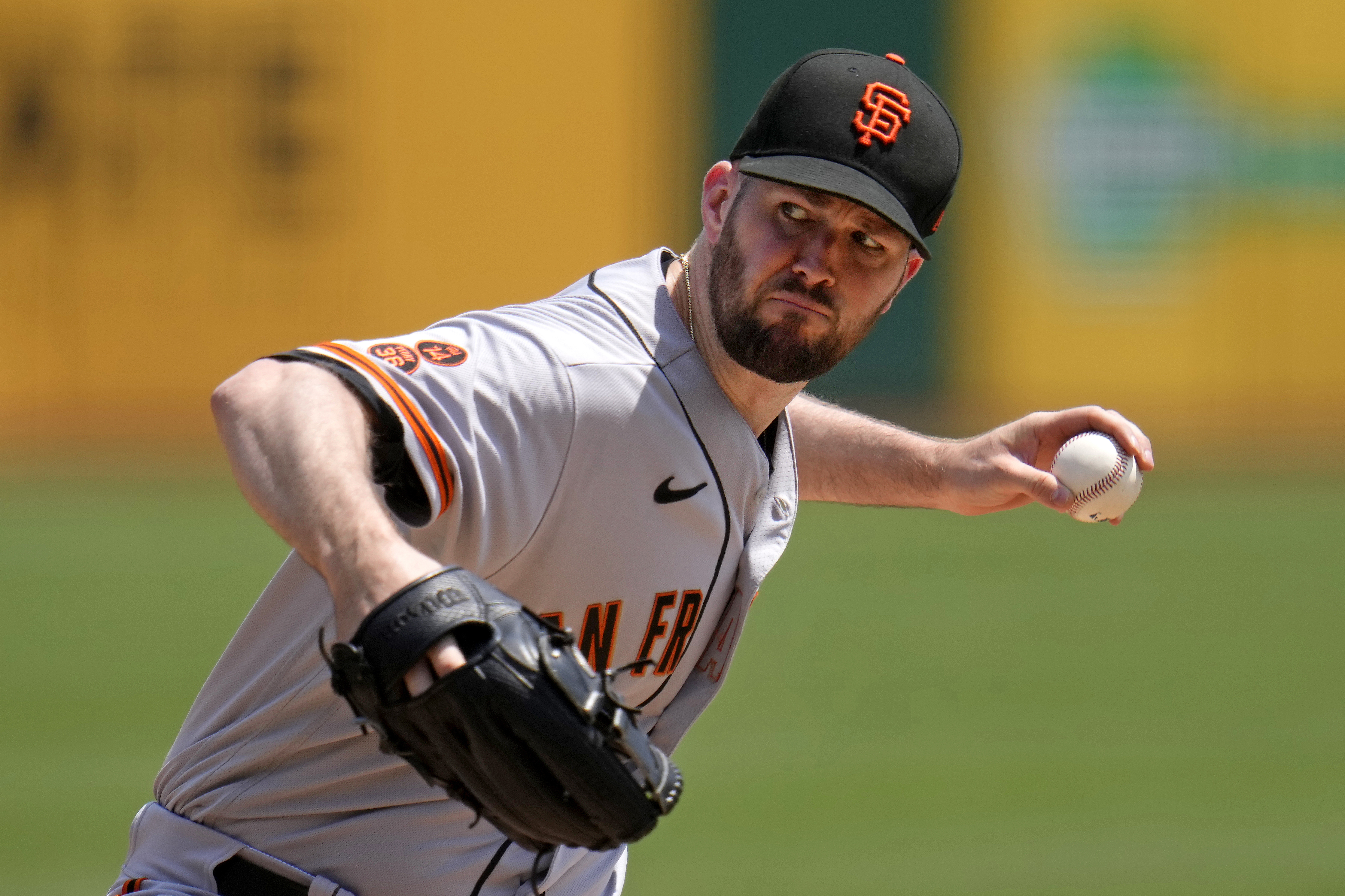 FILE - San Francisco Giants starting pitcher Alex Wood delivers during the first inning of a baseball game against the Pittsburgh Pirates in Pittsburgh, Sunday, July 16, 2023. Wood has agreed to an $8.5 million, one-year contract with the Oakland Athletics, who also acquired right-hander Ross Stripling and cash from the San Francisco Giants, the teams announced Friday, Feb. 2, 2024. 
