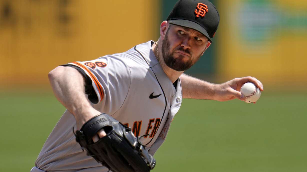 FILE - San Francisco Giants starting pitcher Alex Wood delivers during the first inning of a baseball game against the Pittsburgh Pirates in Pittsburgh, Sunday, July 16, 2023. Wood has agreed to an $8.5 million, one-year contract with the Oakland Athletics, who also acquired right-hander Ross Stripling and cash from the San Francisco Giants, the teams announced Friday, Feb. 2, 2024.