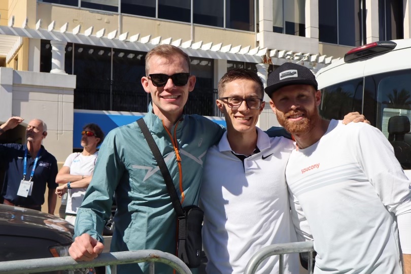 Former BYU harriers Clayton Young and Conner Mantz meet with fellow BYU alum and REP co-founder Jared Ward at the U.S. Olympic marathon trials in on Friday, Feb. 2, 2024 in Orlando, Florida.