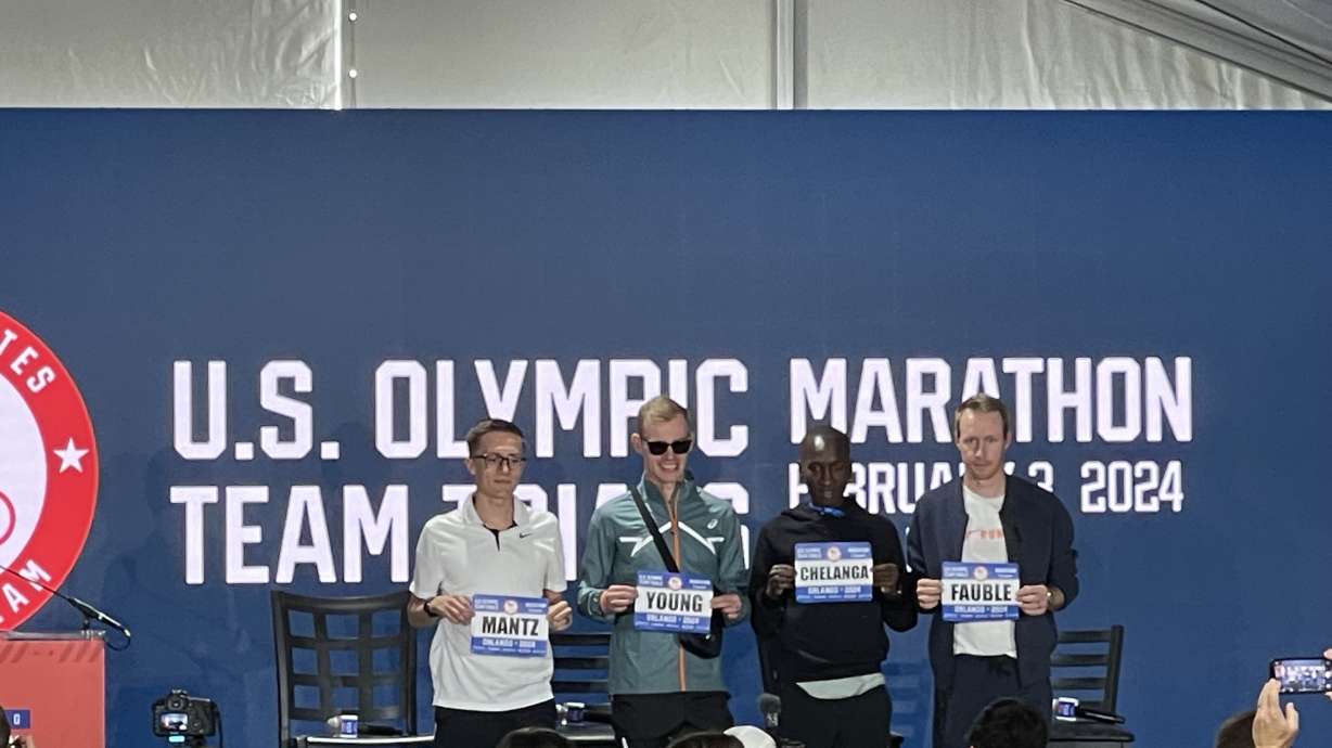 Former BYU harriers Clayton Young and Conner Mantz at a pre-race news conference at the U.S. Olympic marathon trials in on Friday, Feb. 2, 2024 in Orlando, Florida.