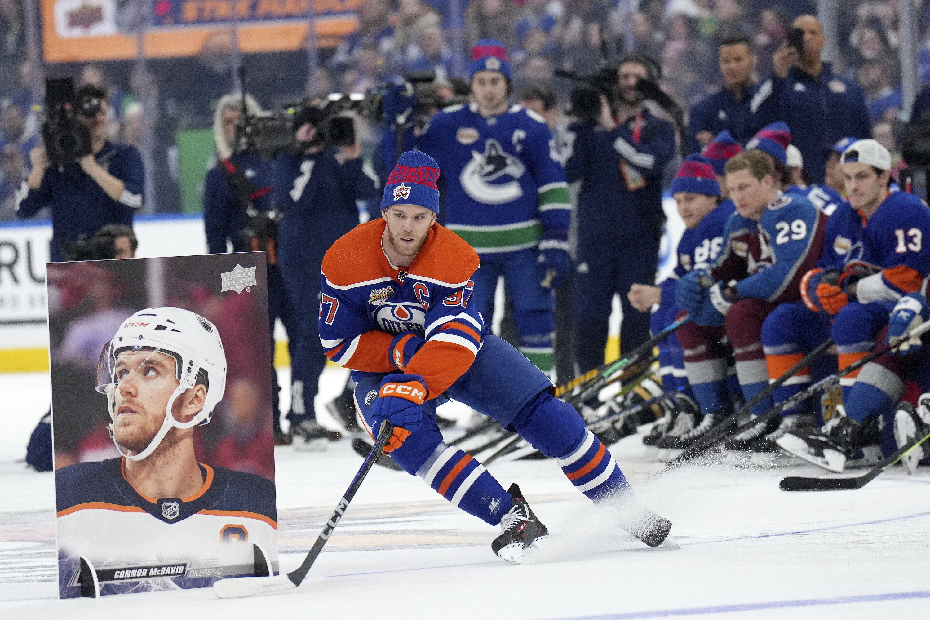 Edmonton Oilers' Connor McDavid navigates the course during the NHL All-Star hockey skills competition's stick handling section, in Toronto, Friday, Feb. 2, 2024. 