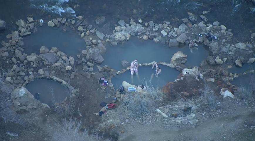 Bathers relax in the Ogden hot pots this week.