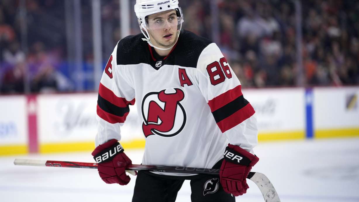 FILE - New Jersey Devils' Jack Hughes plays during an NHL hockey game, Thursday, Nov. 30, 2023, in Philadelphia. Hughes will not participate in the skills competition or 3-on-3 tournament at the upcoming NHL All-Star Weekend because of injury.