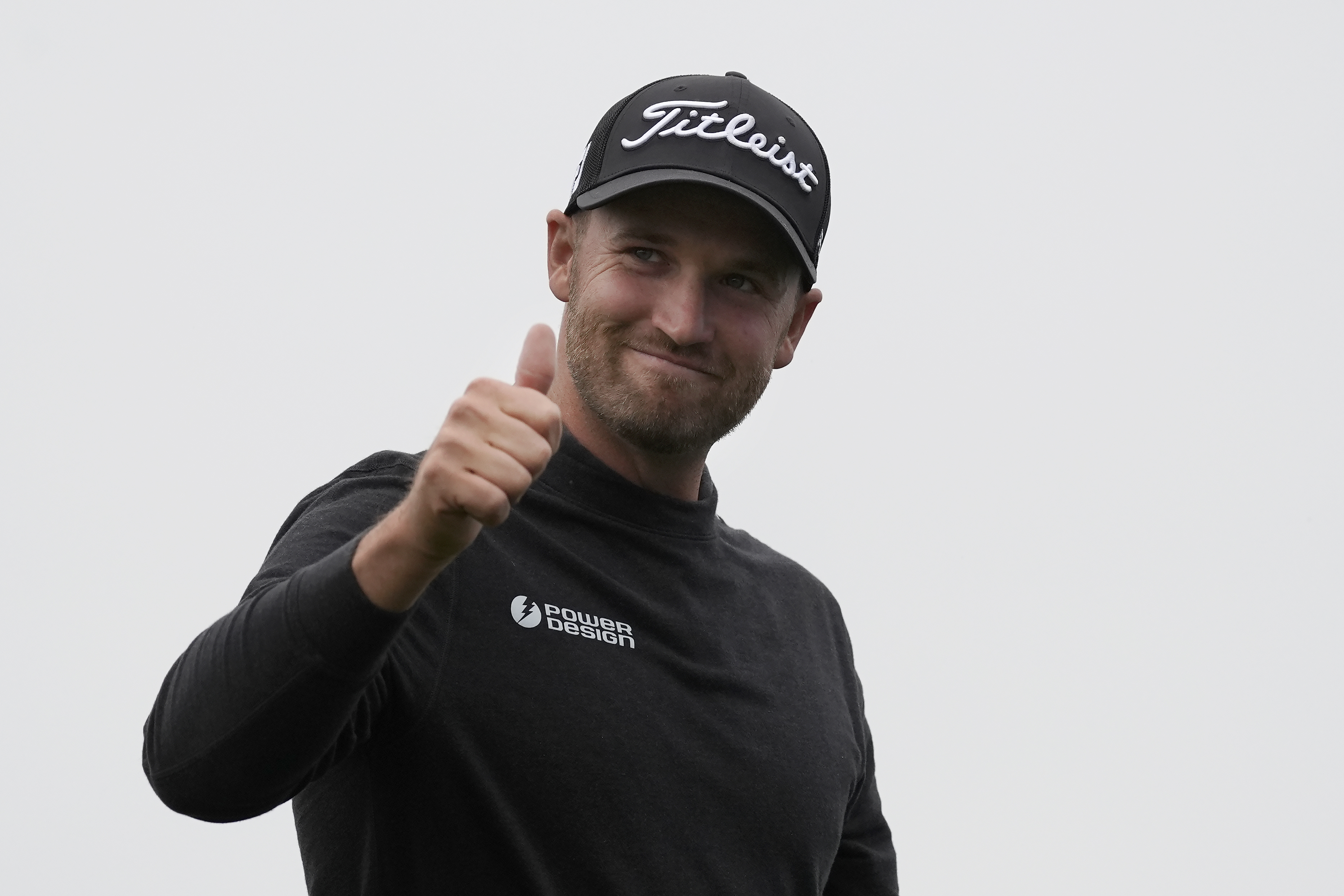 Wyndham Clark gestures after finishing the 18th hole at Pebble Beach Golf Links during the third round of the AT&T Pebble Beach National Pro-Am golf tournament in Pebble Beach, Calif., Saturday, Feb. 3, 2024. 