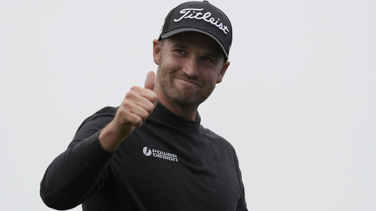 Wyndham Clark gestures after finishing the 18th hole at Pebble Beach Golf Links during the third round of the AT&T Pebble Beach National Pro-Am golf tournament in Pebble Beach, Calif., Saturday, Feb. 3, 2024.