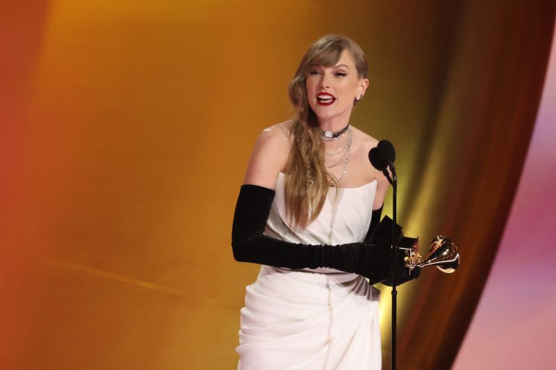 Taylor Swift accepts the award for Best Pop Vocal Album for "Midnights" during the 66th Annual Grammy Awards in Los Angeles on Sunday.