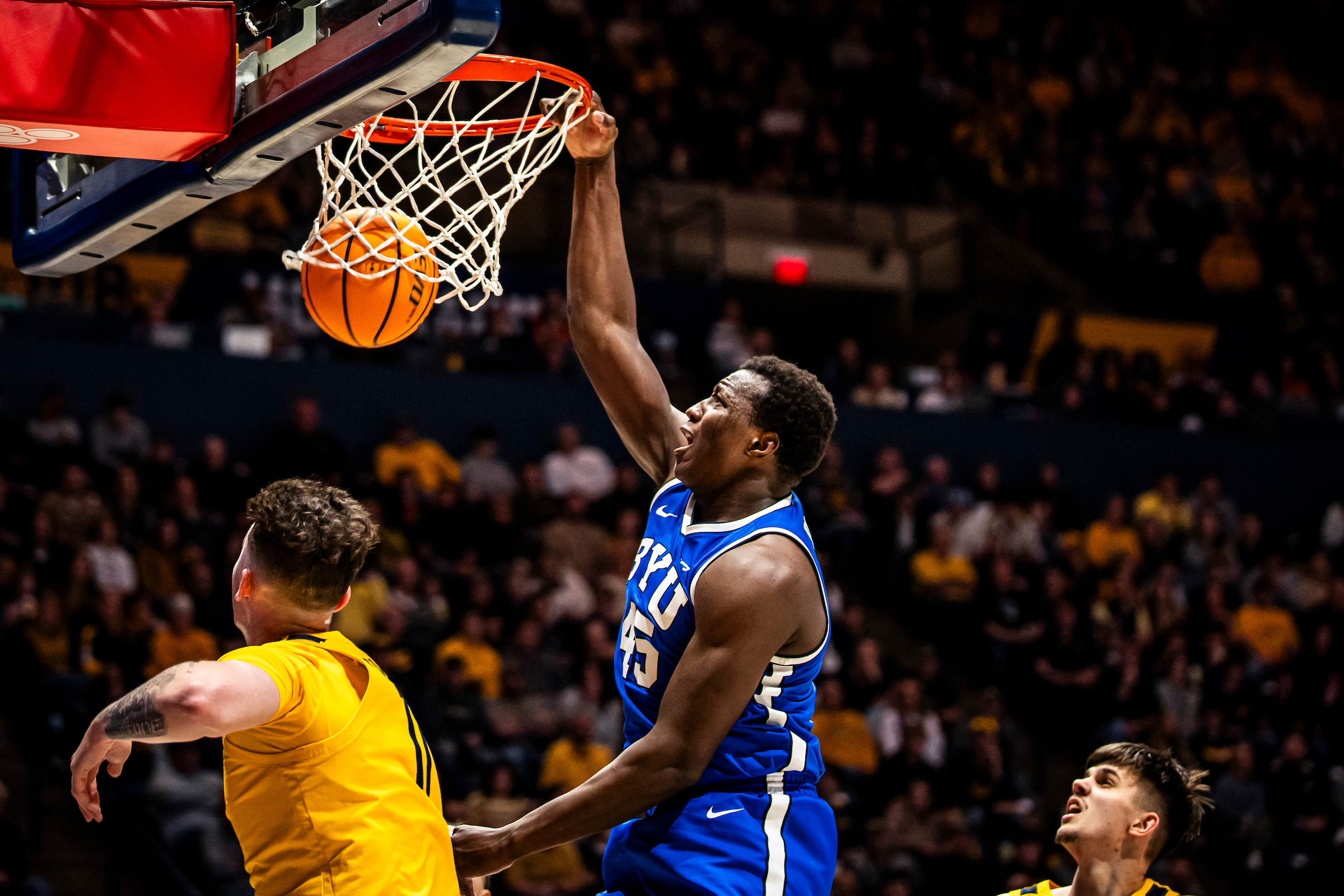 BYU forward Fousseyni Traore throws down a dunk during an 86-73 win over West Virginia, Saturday, Feb. 3, 2024 at the WVU Coliseum in Morgantown, W. Va.