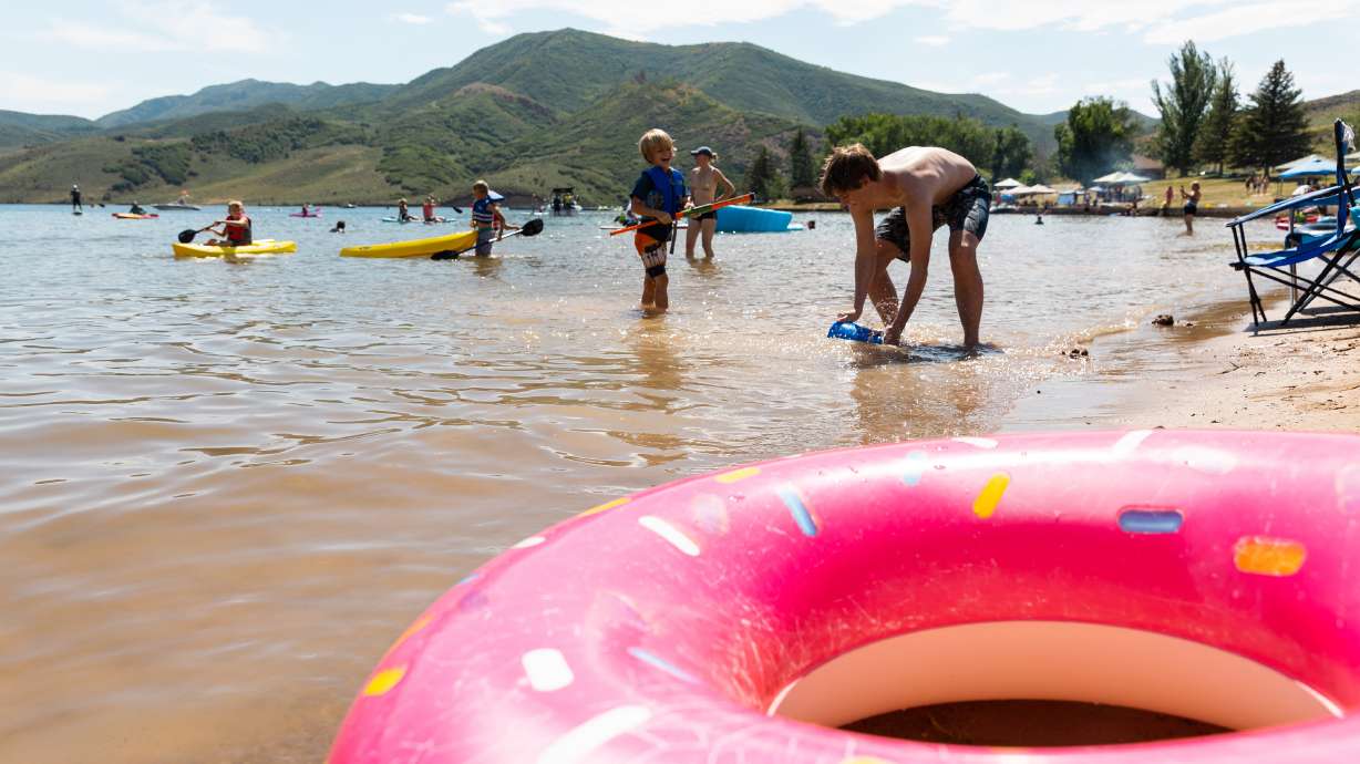 People play in the water at East Canyon State Park in Morgan on July 17, 2023. A pair of Utah divisions are seeking $9.5 million in state funds to help complete a purchase that would expand the park and nearby wildlife refuge.