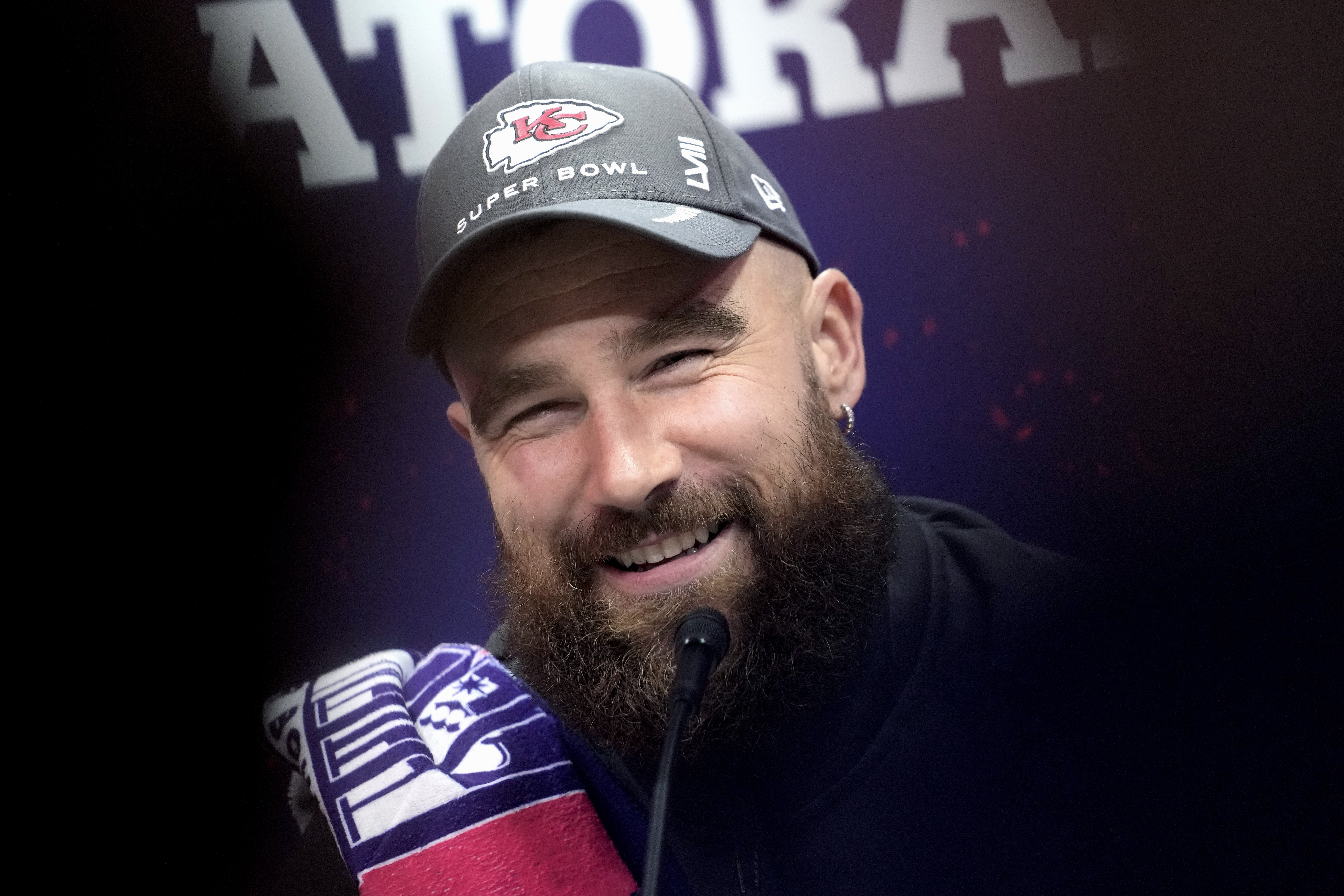 Kansas City Chiefs tight end Travis Kelce smiles as he participates in the NFL football Super Bowl 58 opening night, Monday, Feb. 5, 2024, in Las Vegas. The San Francisco 49ers face the Kansas City Chiefs in Super Bowl 58 on Sunday. 