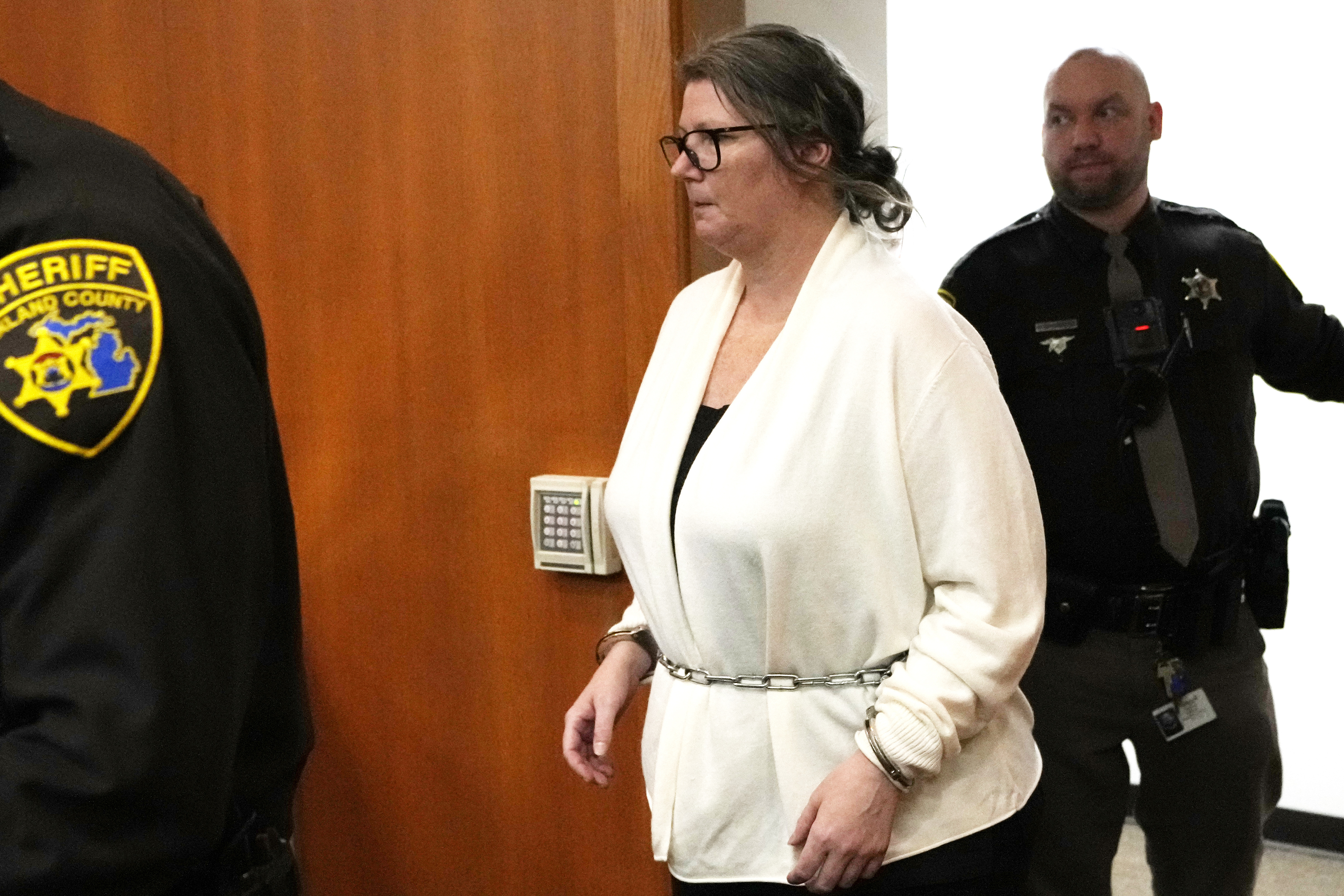 Jennifer Crumbley arrives in court, Monday in Pontiac, Mich. A Michigan jury has found her guilty of involuntary manslaughter in a groundbreaking trial.