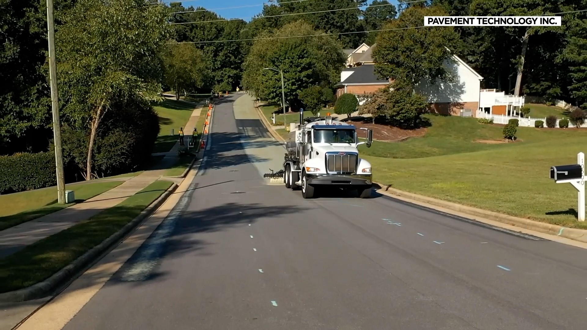 North Carolina maintenance workers are pictured here spraying on treatment.