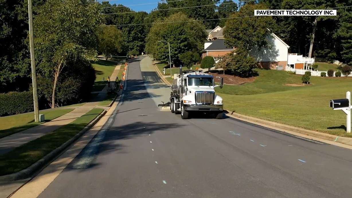 North Carolina maintenance workers are pictured here spraying on treatment.