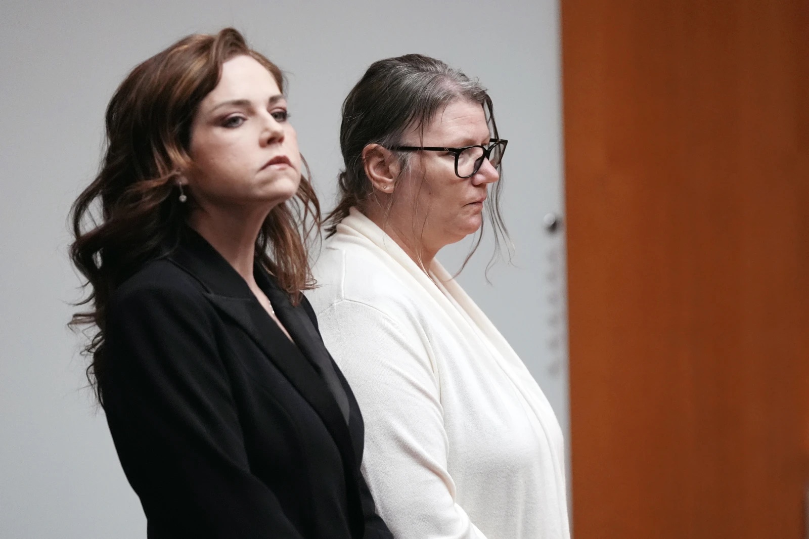 Attorney Shannon Smith, left, stands next to defendant Jennifer Crumbley during her trial, Monday in Pontiac, Mich. A Michigan jury on Tuesday has found Crumbley, a school shooter’s mother, guilty of involuntary manslaughter in a groundbreaking trial to determine whether she has any responsibility in the deaths of four students in 2021.