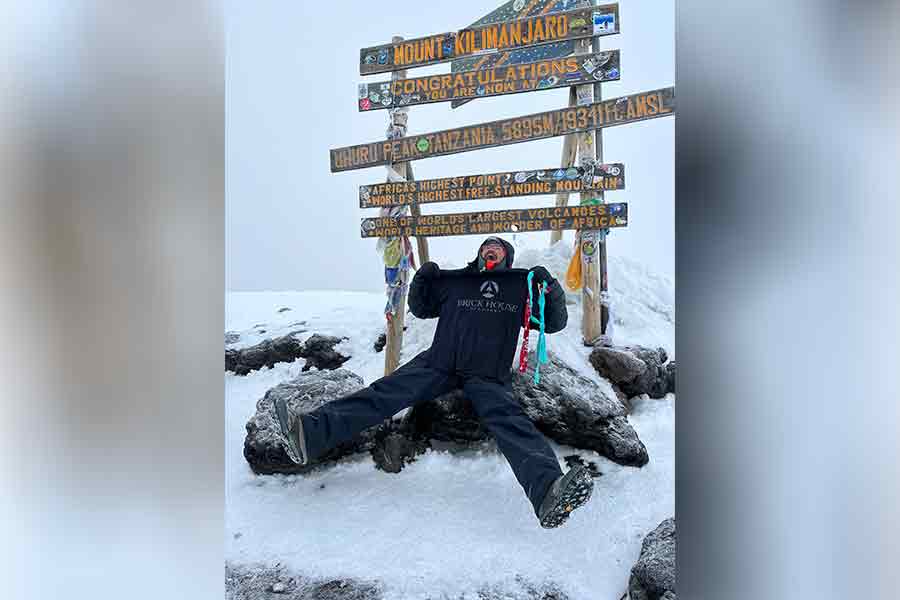Archie Swensen, of Idaho Falls, does a victory dance after summiting Mt. Kilimanjaro in January.