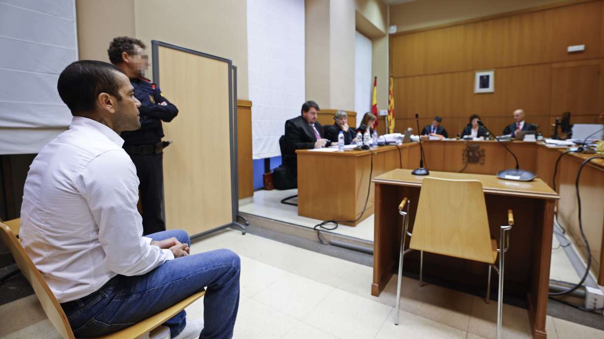 Brazilian soccer star Dani Alves sits during his trial in Barcelona, Spain, Monday, Feb. 5, 2024. Dani Alves goes on trial Monday a year after he allegedly sexually assaulted a young woman at a Barcelona nightclub. The 40-year-old Alves is accused of sexually assaulting the woman on the night of Dec. 30, 2022. He denies any wrongdoing