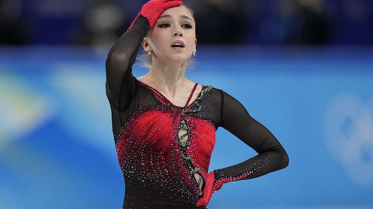 FILE - Kamila Valieva, of the Russian Olympic Committee, reacts in the women's team free skate program during the figure skating competition at the 2022 Winter Olympics, Monday, Feb. 7, 2022, in Beijing. Russian figure skater Kamila Valieva has been disqualified from the 2022 Beijing Olympics. The verdict from the Court of Arbitration for Sport comes almost two years after Valieva's doping case caused turmoil at the Beijing Games.
