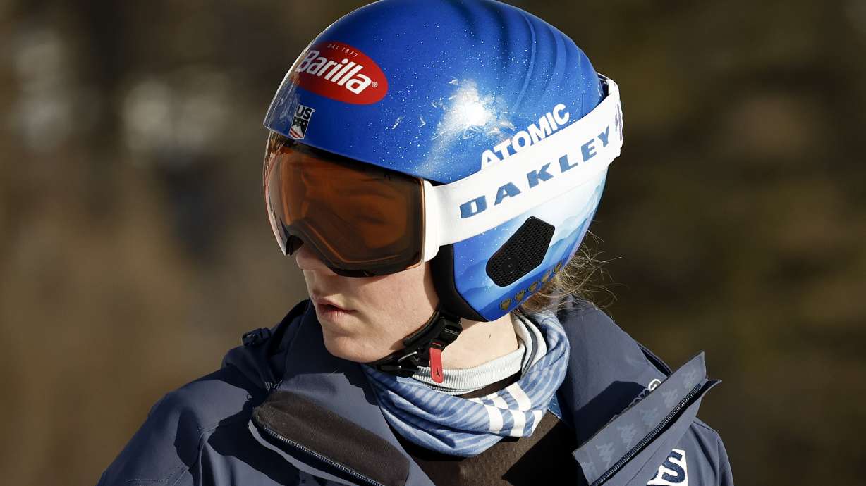 United States' Mikaela Shiffrin concentrates ahead of an alpine ski, women's World Cup downhill race, in Cortina d'Ampezzo, Italy, Friday, Jan. 26, 2024. Shiffrin crashed into the safety nets after losing control landing a jump during a World Cup downhill on Friday.