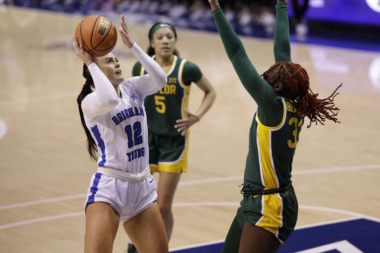 BYU forward Lauren Gustin posts up against #18 Baylor, Wednesday, Feb. 7, 2024 at the Marriott Center in Provo, Utah.