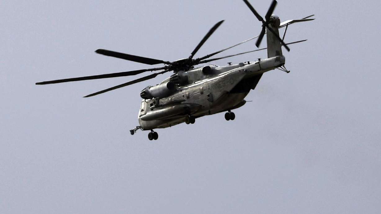 A Marine CH-53E Super Stallion helicopter flies during training at Marine Corps Air Station Miramar in San Diego, Tuesday. U.S. Marines aboard a helicopter that went down in the mountains outside San Deigo are confirmed dead.