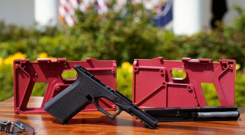 Parts of a ghost gun kit at an event in Washington, April 11, 2022. The Biden administration asked the U.S. Supreme Court to overturn a ruling that would prevent it from regulating privately made firearms that are difficult for law enforcement to trace.
