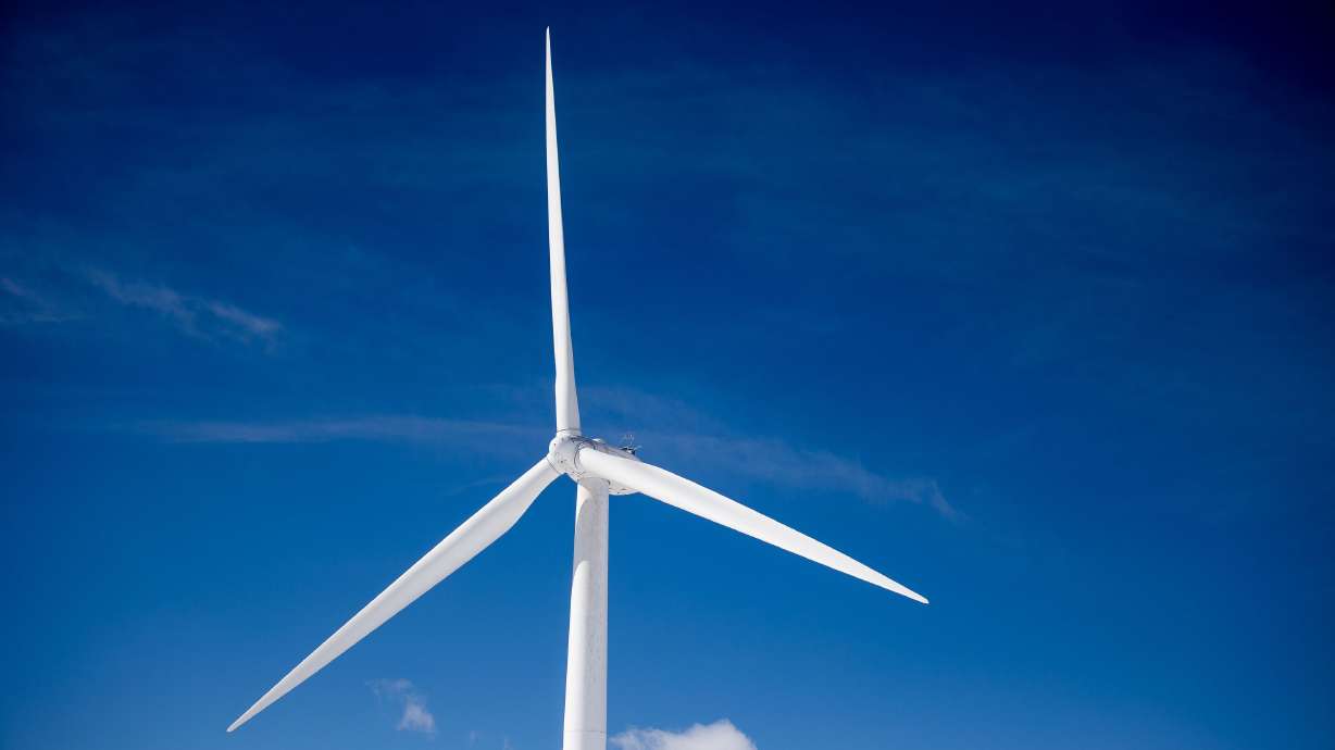 Wind turbines stand at the mouth of Spanish Fork Canyon in Spanish Fork on Feb. 18, 2021. One Utah lawmaker likened the state’s energy policy to a “run-over lizard.”