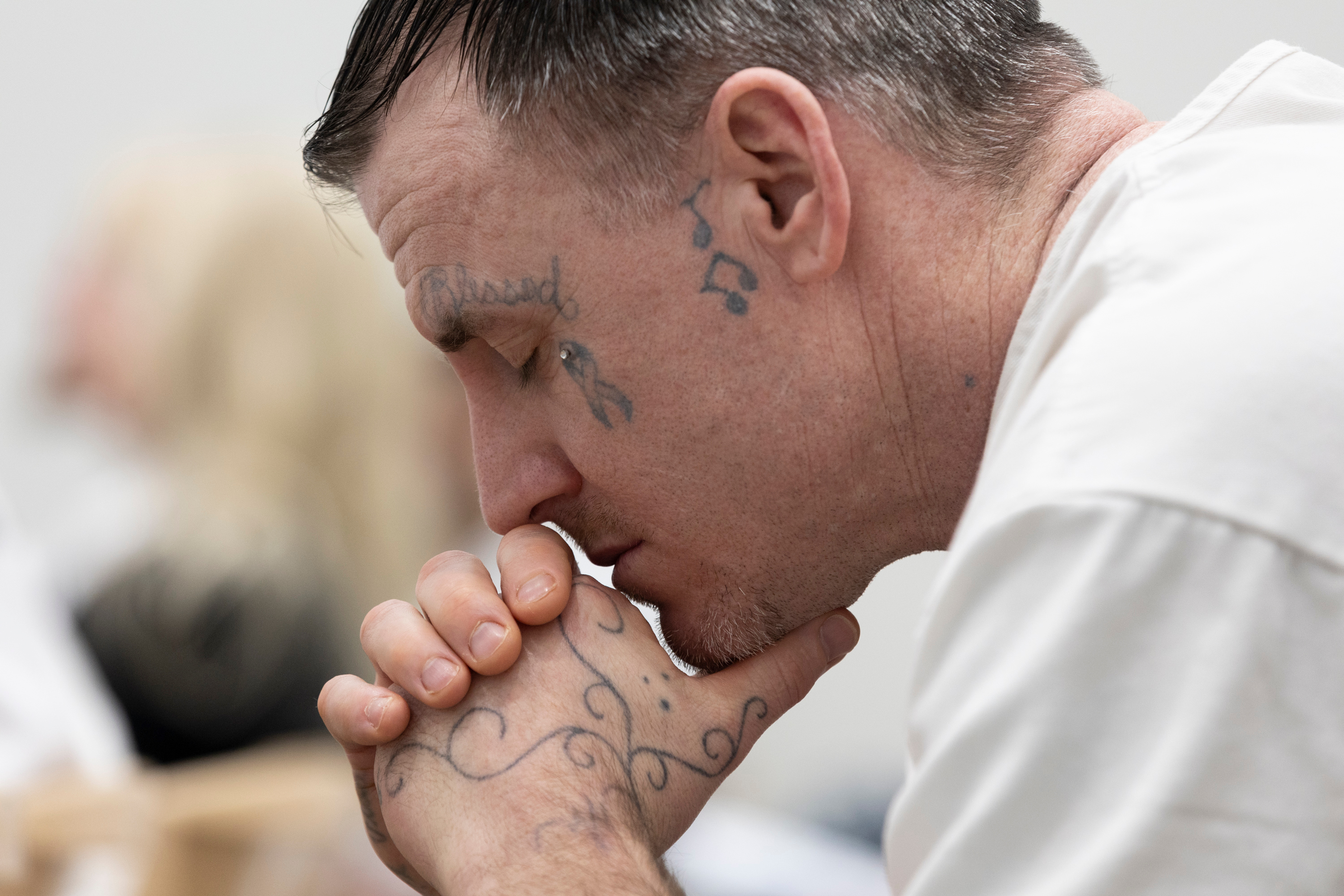 Inmates of the Utah State Correctional Facility gather to attend the sacrament service at The Church of Jesus Christ of Latter-day Saints' prison ministry in Salt Lake City on Sunday, Jan. 28.
