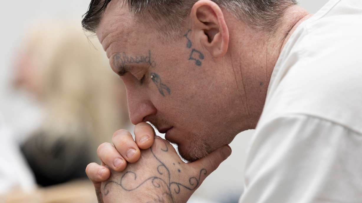 Inmates of the Utah State Correctional Facility gather to attend the sacrament service at The Church of Jesus Christ of Latter-day Saints' prison ministry in Salt Lake City on Sunday, Jan. 28.