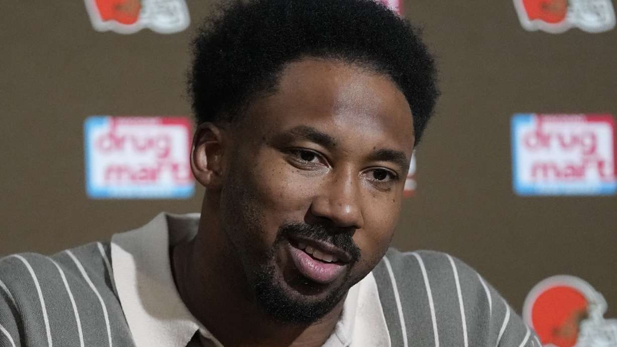 FILE - Cleveland Browns' Myles Garrett speaks during a news conference following an NFL football game against the Chicago Bears, Sunday, Dec. 17, 2023, in Cleveland. Garrett is a finalist for The Associated Press 2023 Defensive Player of the Year.