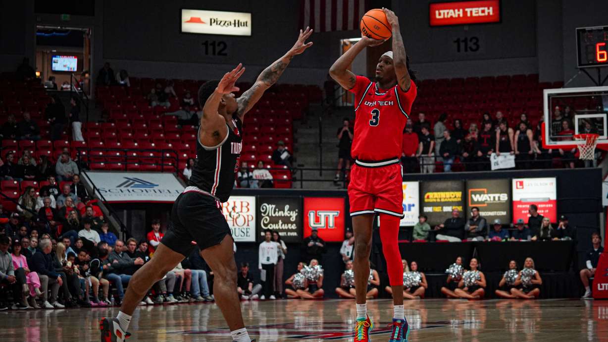 Utah Tech's Jaylen Searles shoots over the defense.