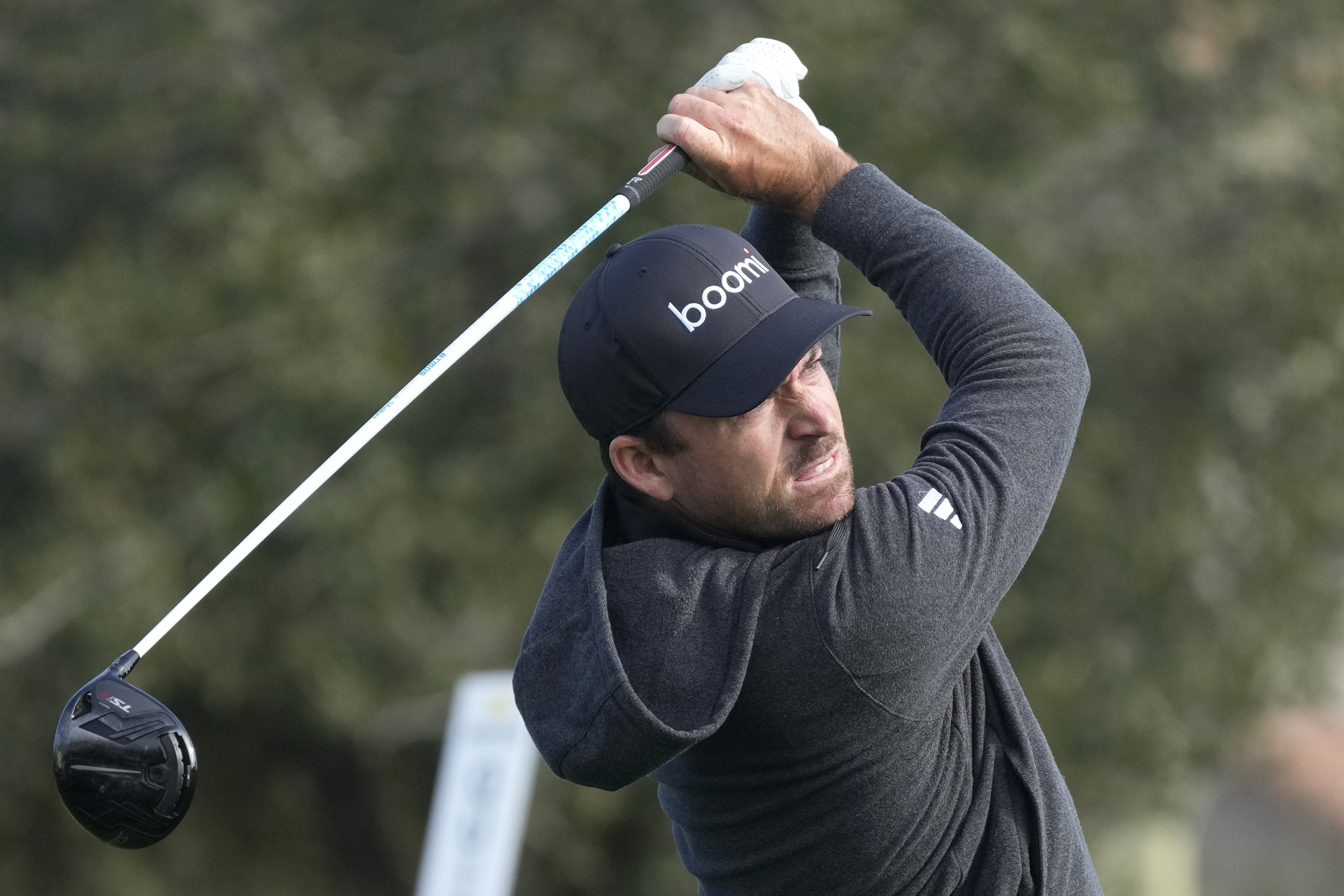 Nick Taylor, of Canada, hits his tee shot on the second hole during the continuation of the first round of the Phoenix Open golf tournament Friday, Feb. 9, 2024, in Scottsdale, Ariz. 