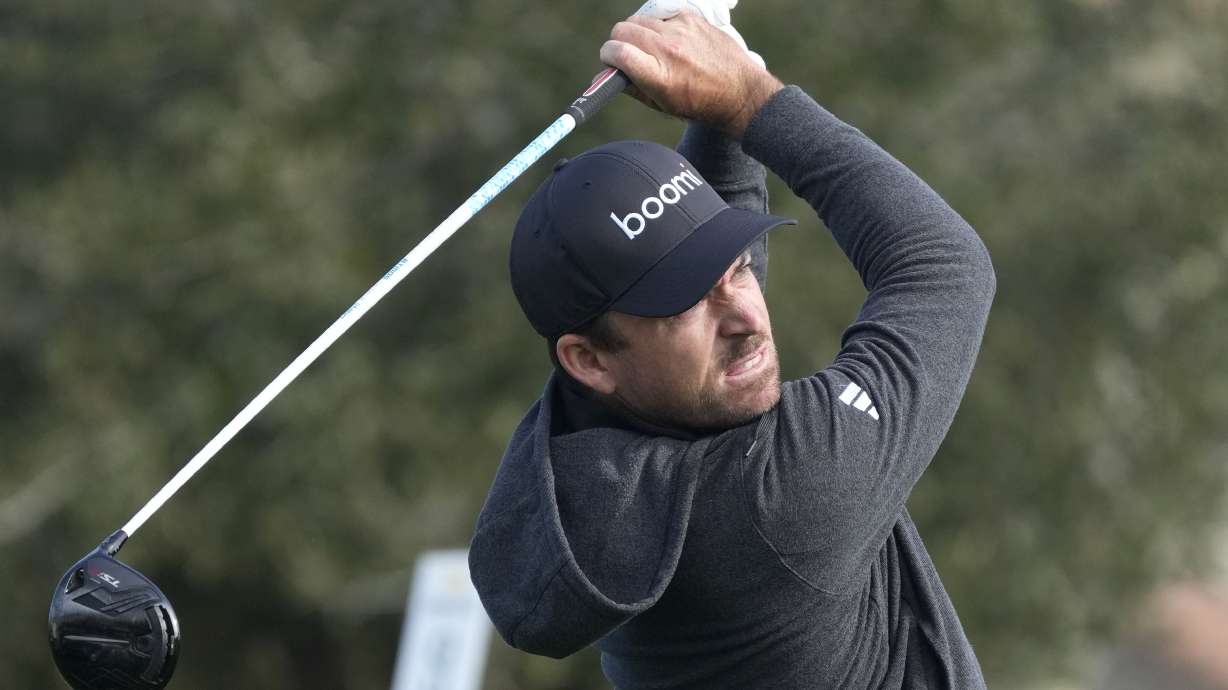 Nick Taylor, of Canada, hits his tee shot on the second hole during the continuation of the first round of the Phoenix Open golf tournament Friday, Feb. 9, 2024, in Scottsdale, Ariz.