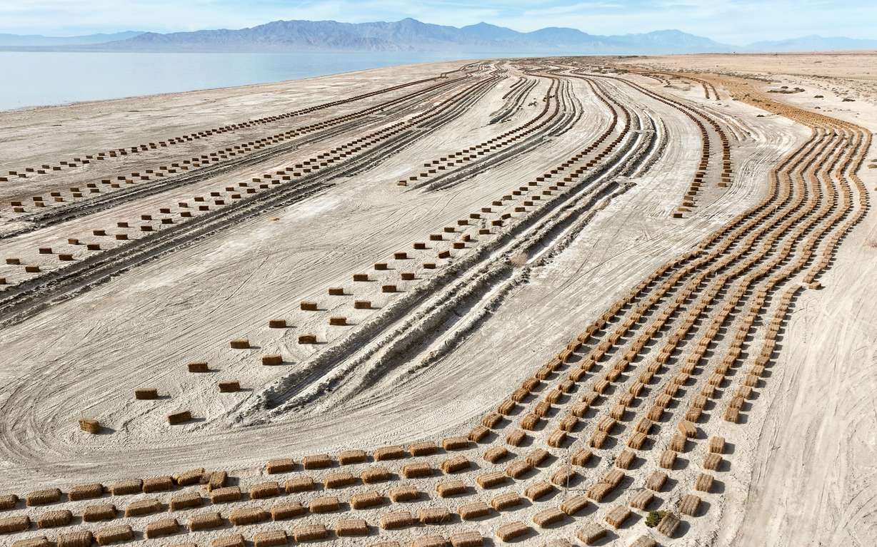 Hay bales used for dust mitigation in a Salton Sea Management Program project are pictured on approximately 68 acres near Bombay Beach, Calif., on Dec. 11, 2023. This is an example of artificial surface roughness, one of the potential solutions when it comes to nonwater dust mitigation at the Great Salt Lake.