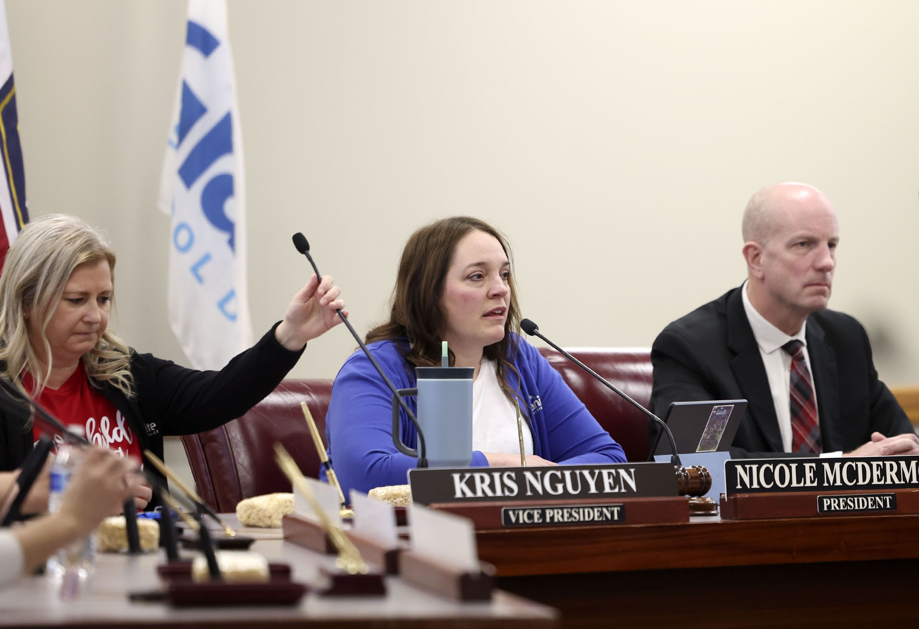 Members of the Board of Education of Granite School District, from left, Kris Nguyen, Nicole McDermott and Superintendent Rich Nye, hold a special meeting to discuss a resolution condemning the actions of Utah State Board of Education member Natalie Cline at the Granite School District in Salt Lake City on Friday.