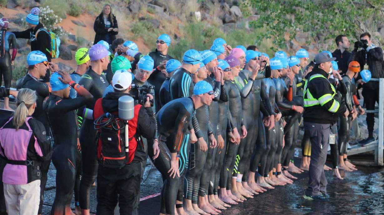 The men’s professional field at the Ironman 70.3 North American Championship lines up at the start line at Sand Hollow Reservoir, Hurricane, Washington County, May 6, 2023