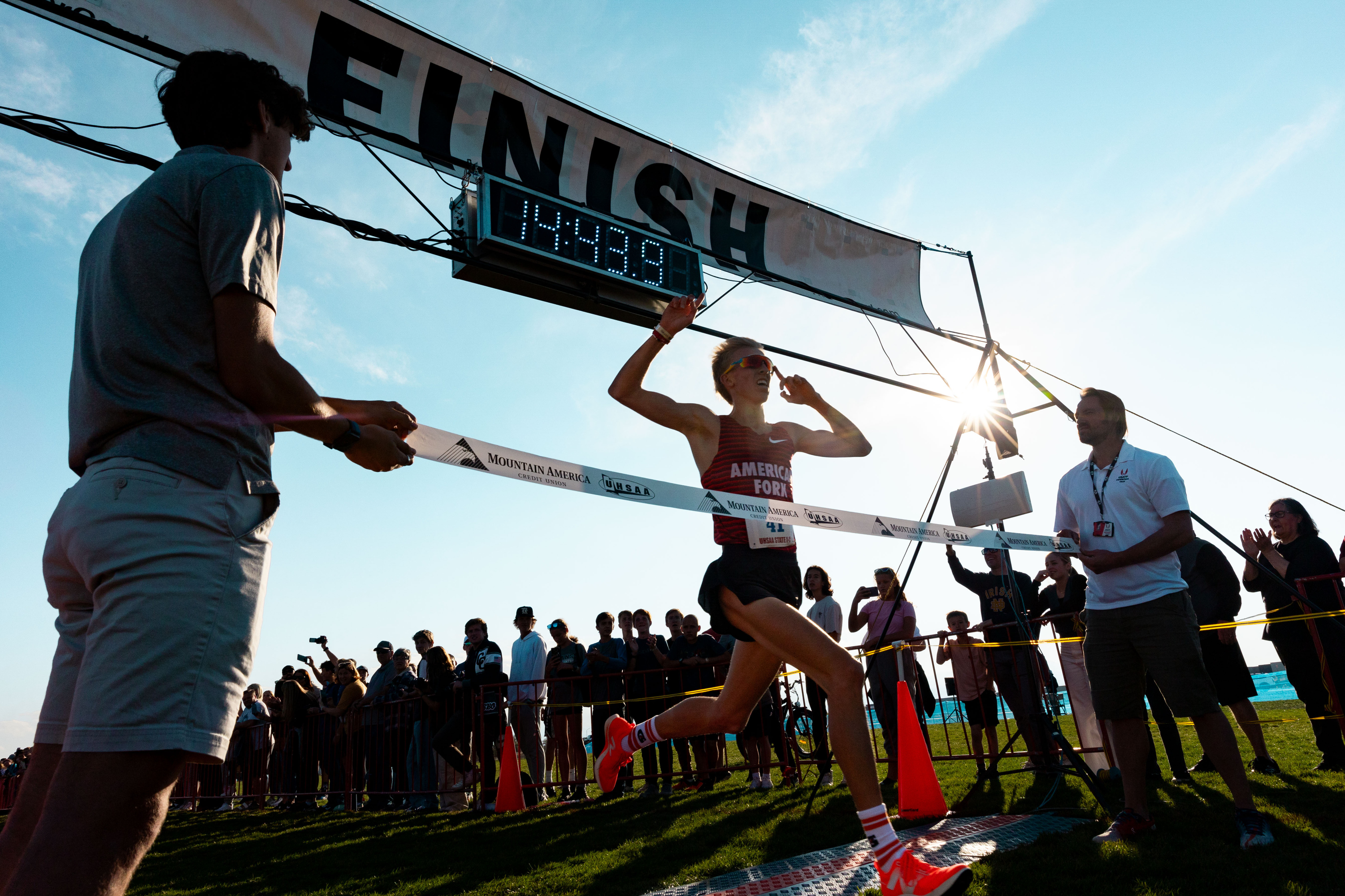 American Fork High School’s Daniel Simmons crosses the finish line, taking first place in the 6A state high school cross-country championships, at the Regional Athletic Complex in Salt Lake City on Tuesday, Oct. 24, 2023.