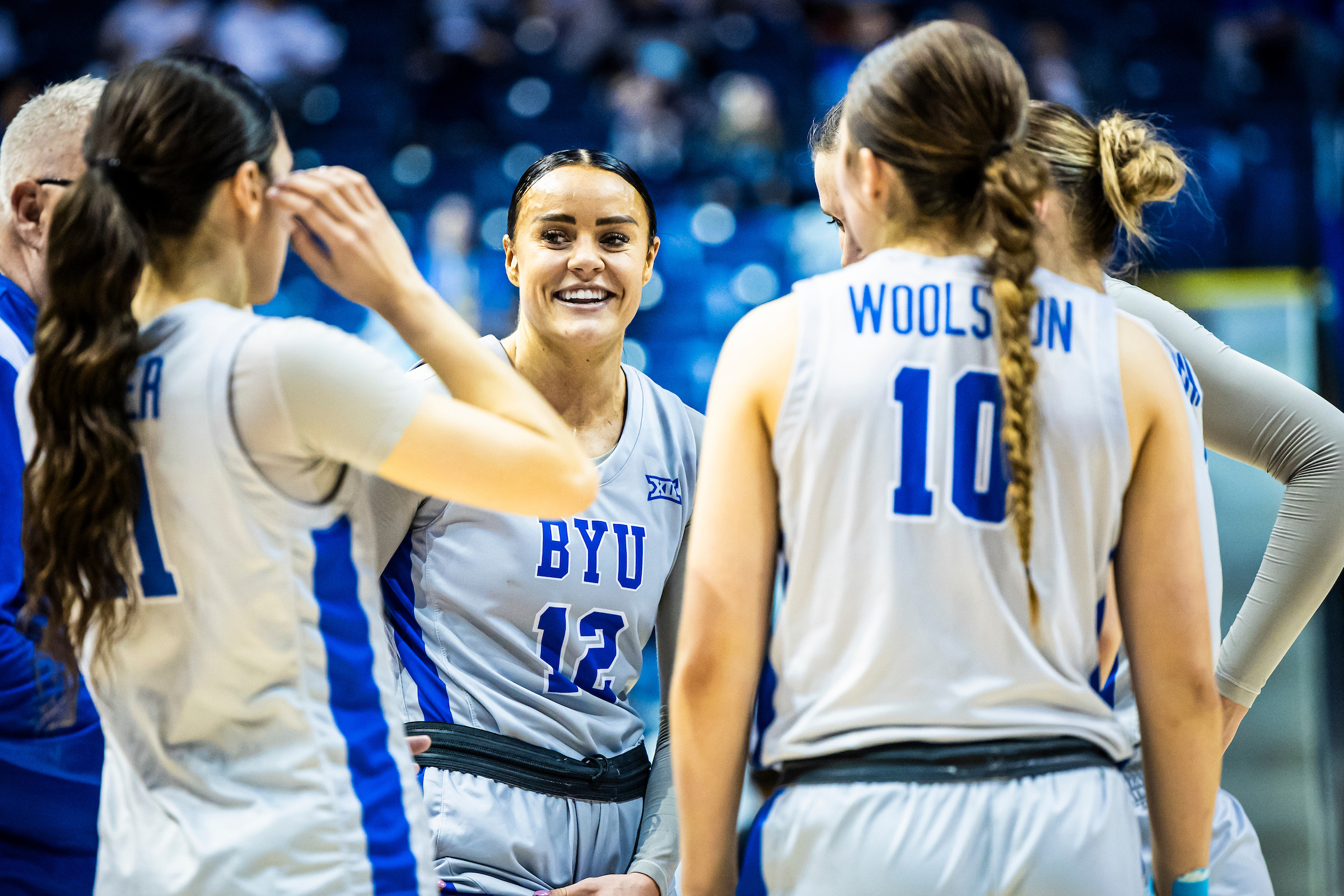 BYU forward Lauren Gustin (12) with her team during a 76-69 loss to No. 25 West Virginia, Feb. 3, 2024 at the Marriott Center in Provo, Utah.