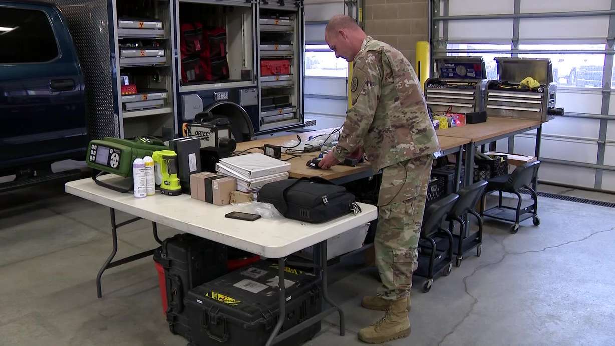Utah National Guard Lt. Col. Rob Dent is the team’s commander. Dent organizes the different equipment they use for security.