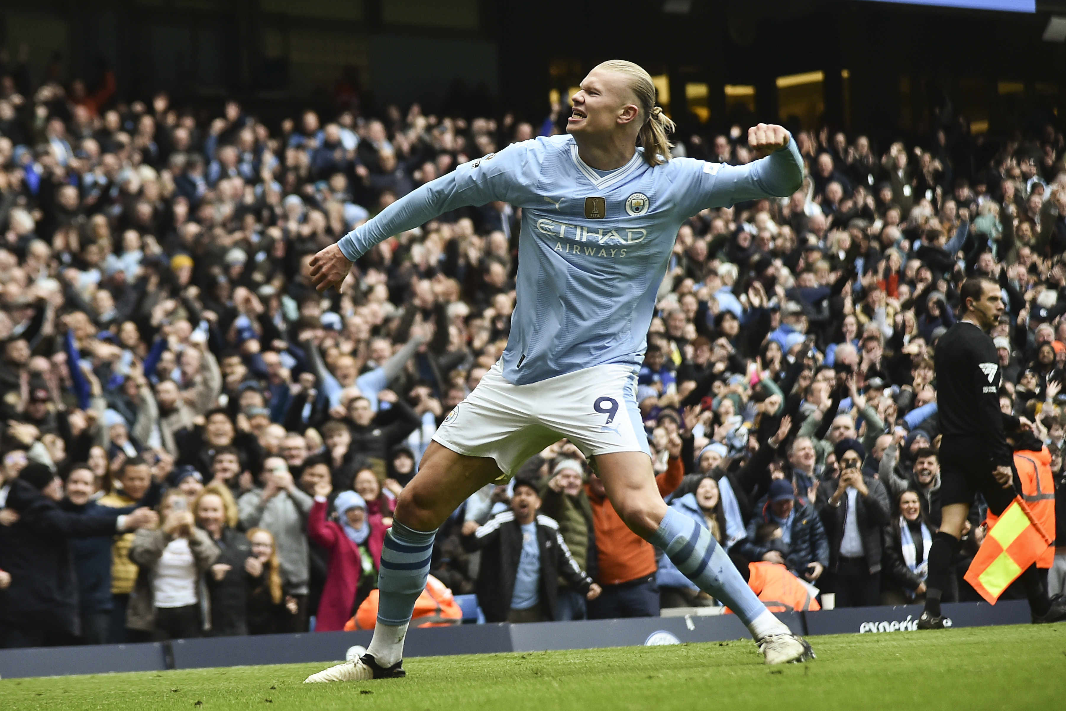 Manchester City's Erling Haaland celebrates with after scoring his side's second goal during the English Premier League soccer match between Manchester City and and Everton, at the Etihad stadium in Manchester, England, Saturday, February 10, 2024. 