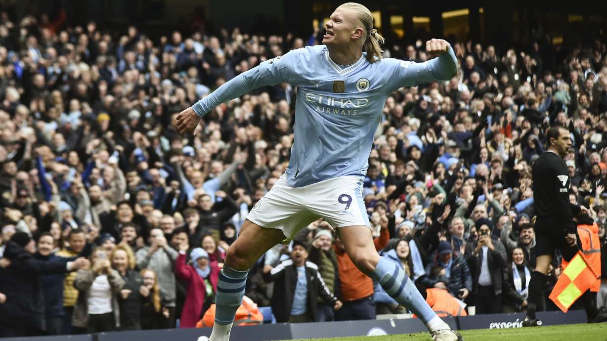 Manchester City's Erling Haaland celebrates with after scoring his side's second goal during the English Premier League soccer match between Manchester City and and Everton, at the Etihad stadium in Manchester, England, Saturday, February 10, 2024.