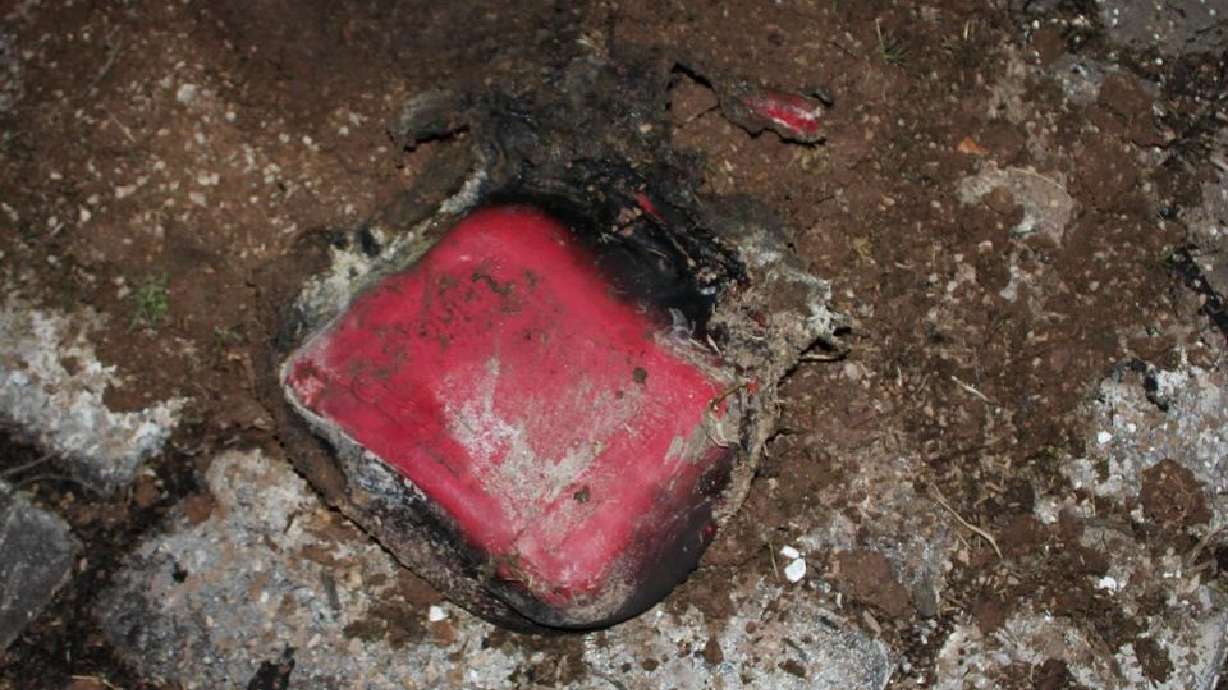 The charred, melted remains of a gas container a 12-year-old used to pour gasoline on a campfire in Hurricane, Washington County, on Saturday evening. The boy sustained second- and third-degree burns, fire officials say.