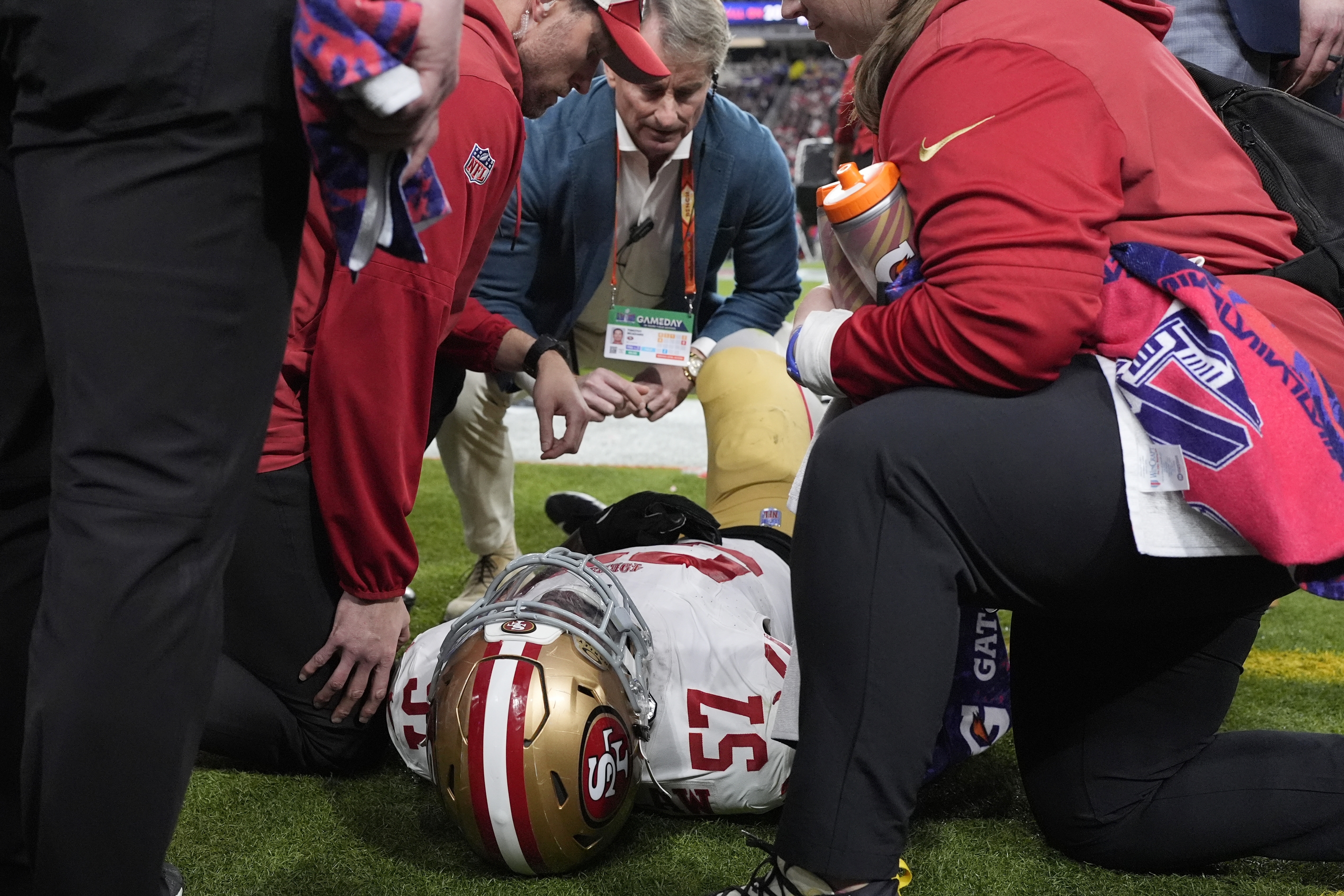 San Francisco 49ers linebacker Dre Greenlaw (57) is helped after an injury against the Kansas City Chiefs during the first half of the NFL Super Bowl 58 football game Sunday, Feb. 11, 2024, in Las Vegas.