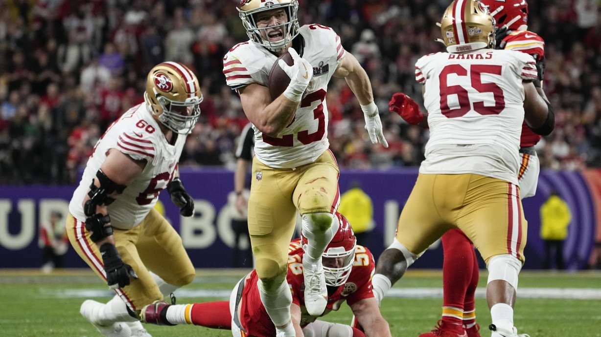 San Francisco 49ers running back Christian McCaffrey (23) runs into the end zone for a topuchdown against the Kansas City Chiefs during the first half of the NFL Super Bowl 58 football game Sunday, Feb. 11, 2024, in Las Vegas.