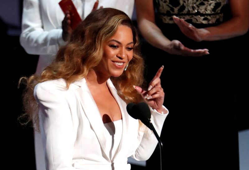 Pop superstar Beyonce, seen here in L.A. in 2019, released two new songs after making a surprise appearance in a Super Bowl commercial.