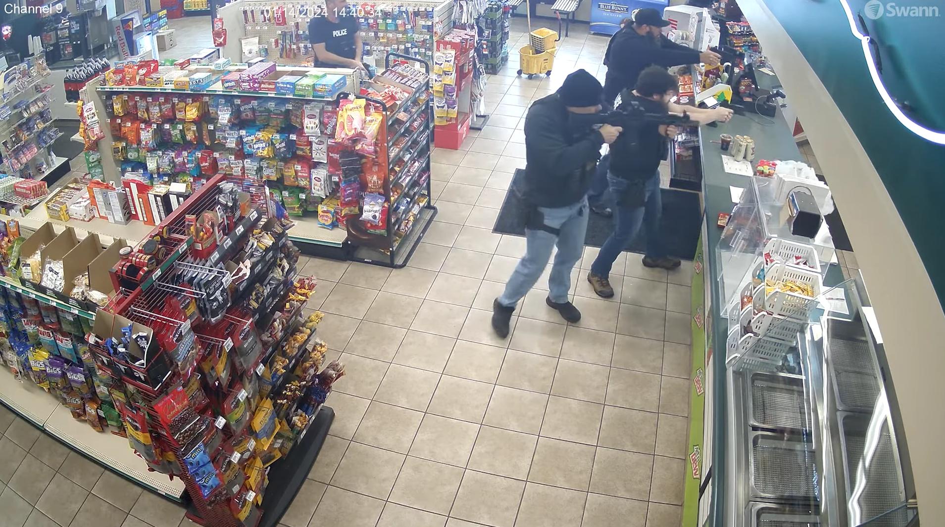 The image, from surveillance video, shows officers firing at William Toon, not seen, in a Riverdale convenience store on Jan. 14, 2024. Toon, killed in the confrontation, was a suspect in an attempted murder in Pleasant Grove, and the officers were attempting to detain him.