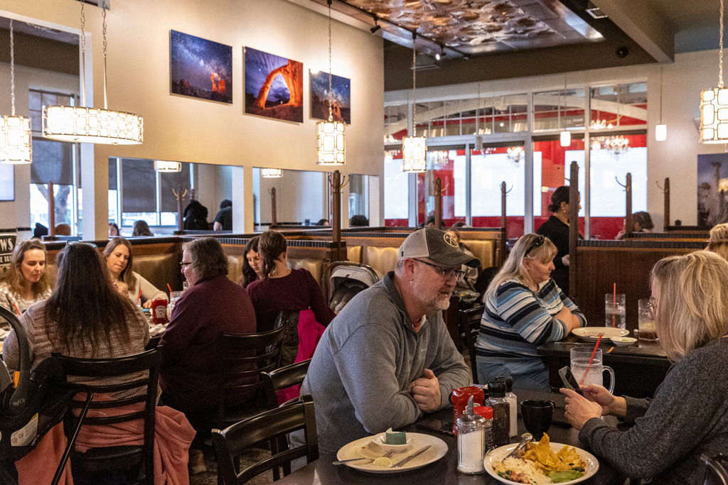 Customers enjoy meals at TRUreligion Pancake & Steakhouse in Orem on Jan. 25. The owner, Jim Leany, is committed to creating a space that feels welcoming and harks back to the Salt Lake City staple, Lamb’s Grill, with original booths, tables, doors and chairs.