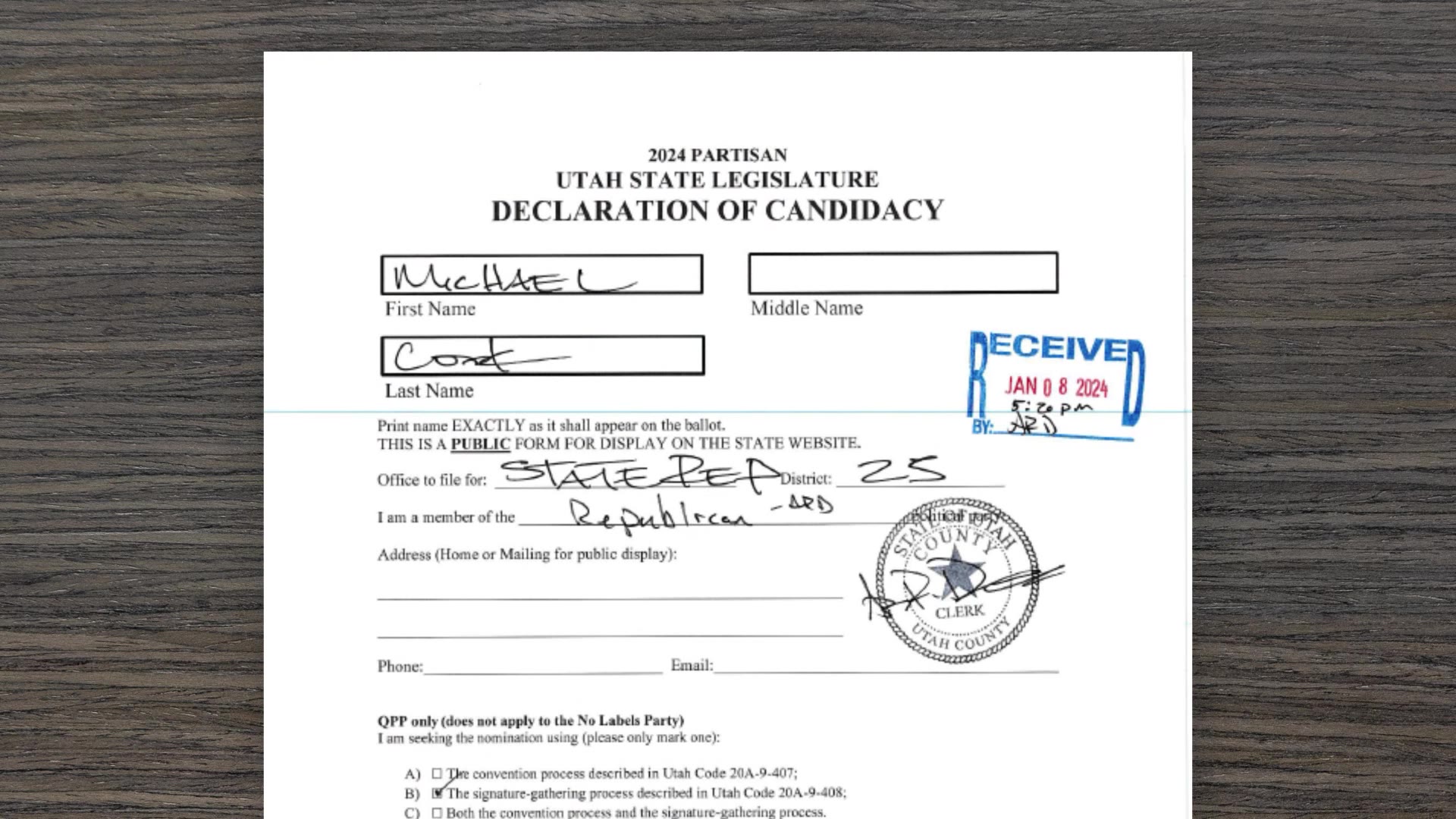 The form that candidate Michael Cook initially filed out and that Utah County Clerk Aaron Davidson edited further.